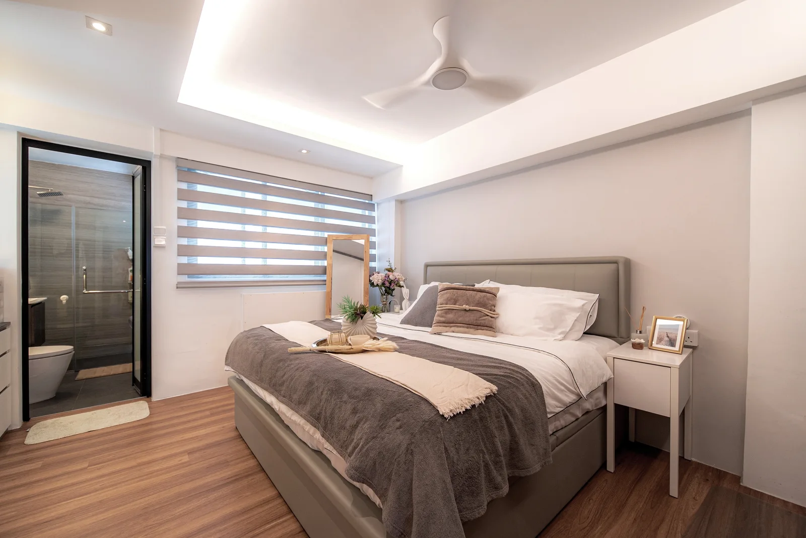J Concept Designers &mdash; master bedroom with upholstered headboard, layered blinds and ensuite