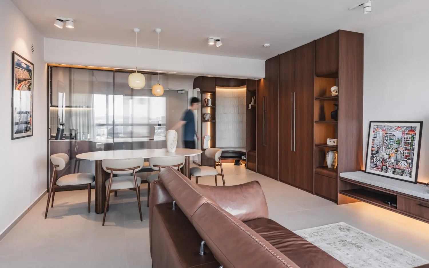 Rondure living and dining room by mono.poly with warm timber cabinetry