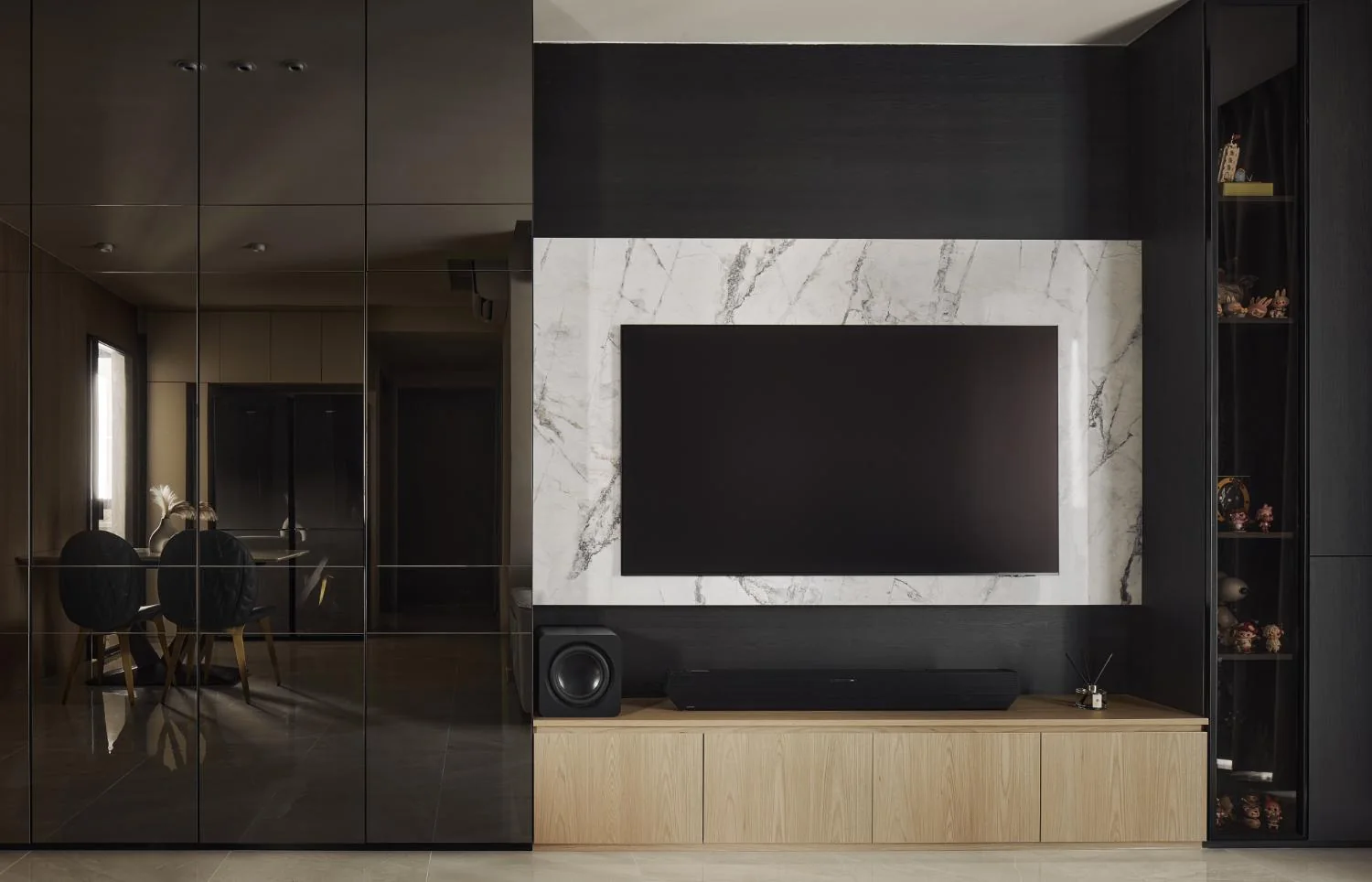 Living room TV console at Esparina Residences by RENOSTUD.IO