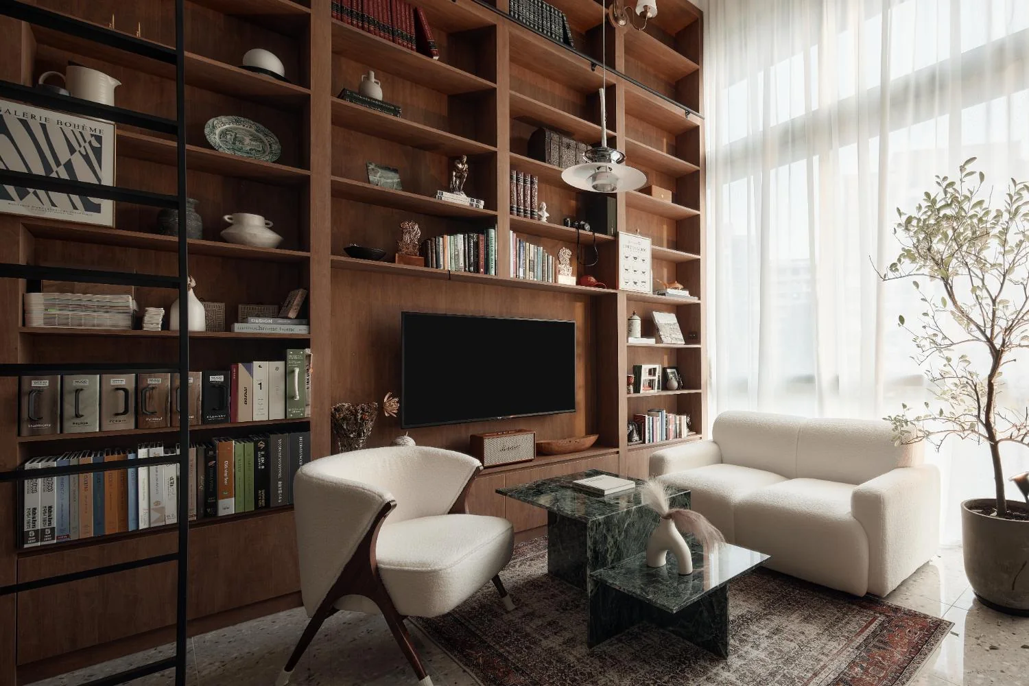 RENOSTUD.IO consultation lounge and full-height bookshelf at Woods Square